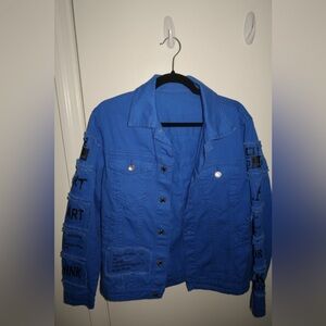 Blue Graphic Denim Jacket with Distressed Details
FREE SHIPPING ★